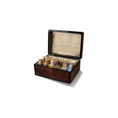 an old wooden box filled with lots of bottles