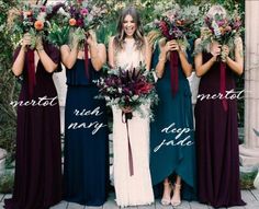 a group of women standing next to each other holding bouquets with different names on them