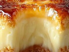 a close up view of a cake with caramel sauce on it's crust