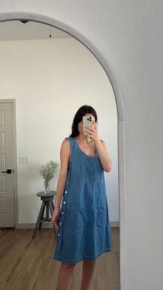 Adorable vintage denim mini overall dress from the 90s with front pockets. Great staple! In good vintage condition. Measurements taken while item is laid flat. Measurements: bust: 24" waist: 23" length: 24.5" Tag size: 20w Fabric: Cotton Model is 5'6 with a waist 26" and hips 36" FOLLOW US ON INSTAGRAM @theweathereddaisy FOR RELEASE DATES + STORY SALES! SHOP OUR WEBSITE theweathereddaisy.com FOR EVEN MORE EXCLUSIVE APPAREL. Casual Mini Pinafore Dress With Pockets, Casual Medium Wash Pinafore Dress For Spring, Casual Sleeveless Denim Pinafore Dress, Casual Denim Pinafore Dress With Pockets, Medium Wash Denim Overall Dress With Pockets, Jean Overall Dress, Vintage Denim Jeans, Denim Overall Dress, Overall Dress