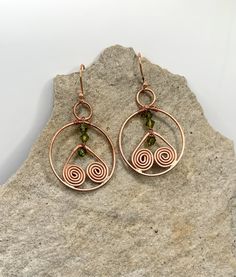 These intricate copper earrings are approximately 2 inches long. Copper Chandelier Dangle Earrings For Pierced Ears, Unique Copper Wire Drop Earrings, Bronze Drop Earrings With Copper Wire, Copper Dangle Earrings With Ear Wire, Unique Bronze Copper Wire Earrings, Nickel Free Copper Dangle Earrings, Bronze Copper Wire Drop Earrings, Nickel-free Copper Dangle Earrings, Bronze Teardrop Copper Earrings