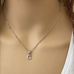 Description: 925 Sterling Silver Mini Small Initial Letter C Pendant Necklace Item No.: H89.Q Metal Type: 925 Sterling Silver (Available In 10k And 14k Gold) Metal Color: Silver Height With Bale: 15 Mm Width: 4.8 Mm Italian Rolo Chain In 16", 18", 20", 22" Available In Another Listings In Any Letter A-Z Made To Order. Please Allow 10-15 Days To Be Shipped. Silver Dainty Initial Necklace For Formal Occasion, Silver Initial Necklace For Everyday Wear, Silver Round Initial Necklace For Formal Occasions, Classic Silver Initial Necklace For Formal Occasions, Silver Formal Initial Necklace, Silver Sterling Silver Initial Necklace For Everyday, Nickel-free Silver Sterling Initial Necklace, Everyday Silver Sterling Initial Necklace, Classic Silver Initial Necklace For Anniversary