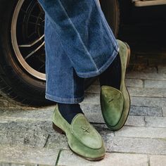 A classic design with a modern perspective. Meet the Milano Loafer – our best-selling silhouette that gives a modern perspective to a classically cool design. Inspired by the refined looks found in one of the world’s most well-dressed cities, the Milano is handcrafted by our family of artisans throughout Italy. The uppers are constructed from soft high-grade Italian leathers and suedes that are complemented with the hand-stitched quality detailing that Del Toro has become known for. A custom rub Green Loafers Outfit, Loafers Street Style, Green Suede Shoes, Suede Shoes Men, Tuxedo Shoes, Loafers Outfit, Velvet Slippers, Wedding Dress Shoes