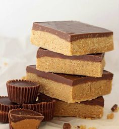 chocolate and peanut butter bars stacked on top of each other