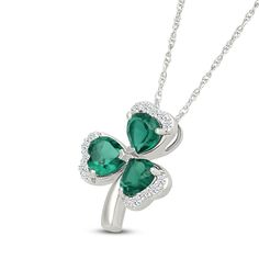 This darling three-leaf clover necklace could be your lucky charm. Sterling silver The pendant showcases a trio of heart-shaped lab-created emeralds, each edged in round white lab-created sapphires 18-inch rope chain with spring ring clasp Elegant Green Emerald Heart Pendant Necklace, Heart-shaped Emerald Necklace For Anniversary, Heart Shaped Emerald Necklace, Anniversary Heart-shaped Emerald Necklace, Green Heart-cut Emerald Necklace, Jewelry Style Guide, Anniversary Wedding Band, Wedding Band Styles, Jared The Galleria Of Jewelry