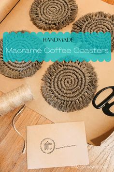 three coffee coasters sitting on top of a wooden table next to scissors and thread