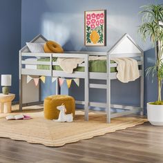 a child's bedroom with bunk beds and toys