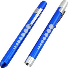 two blue pens sitting next to each other on top of a white surface with dots