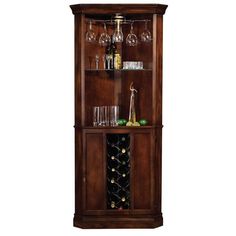 a tall wooden cabinet with wine glasses and bottles in it's bottom shelf,