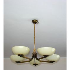 Brass & Glass Chandelier, 1930s, in Very Good conditions.  Designed 1920 to 1949 Up to 250V (Europe/UK Standard).The wiring of this item may be original and might need replacement, if not specified otherwise. Display Cabinet Decor, Vintage Brass Chandelier, Pouf Chair, Pearl Chandelier, Wrought Iron Chandeliers, Ceramic Wall Decor, Metal Pendant Lamps, Garden Table And Chairs, Art Deco Chandelier