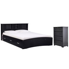 a black bed with two drawers and a night stand in front of it on a white background