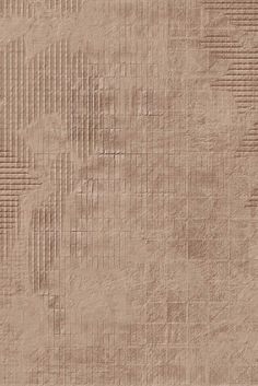 an image of a textured paper background with lines and squares in brown tones,