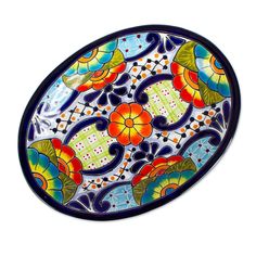 a colorful plate is shown on a white background