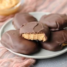 chocolate covered peanut butter bites on a plate