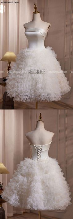 three different views of a mannequin with white feathers on it and a lamp in the background