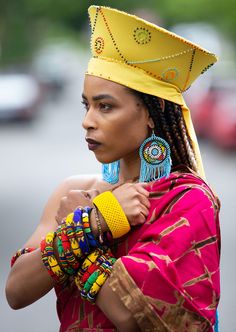 Showcase your African style in our beautiful Zulu Beaded Bucket Hat. Handmade by Zulu female artisans in South Africa, the hat is very lightweight and can be worn at any occasion. Adjustable tie in the back make this a one size fits all item. Various colors include black, white, dark blue, light blue, orange, red, yellow -- all with beading. Native Outfits, Zulu Women, Pokemon Jewelry, Afro Fashion, African Hats, Beaded Hat, Black Knowledge, Head Dress, Hat Handmade