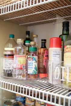 an open refrigerator filled with lots of food and condiments