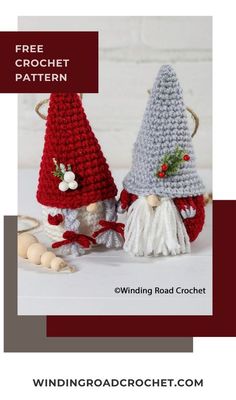 two crocheted gnomes sitting next to each other