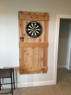 a dart board mounted to the side of a wall