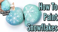 how to paint snowflakes on rocks with text overlay that reads, how to paint snowflakes