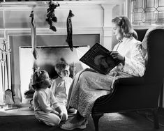 1940s 1950s Mother Reading Christmas Story, Sitting By Fireplace Hung With Stockings Wall Art apart of the Panoramic Images Collection from Great BIG Canvas. Sitting By Fireplace, 1950s Mother, Christmas Photography Family, Mommy And Son, Kids Photoshoot, Christmas Photography, Christmas Story, Vintage Christmas Cards, A Christmas Story