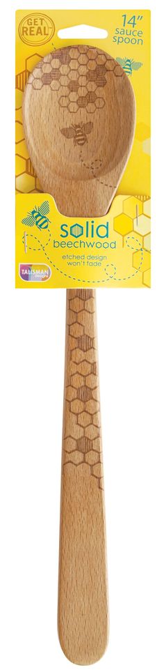 a wooden spatula is shown in front of a package for it's packaging