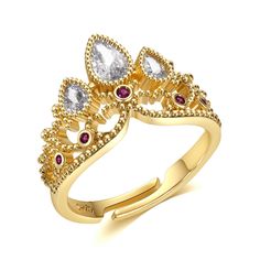 a yellow gold ring with white and pink stones