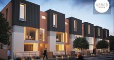 an artist's rendering of a row of townhouses at dusk with people walking on the sidewalk