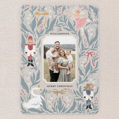 a christmas card with an image of a family