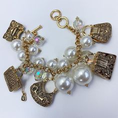 Pearl charm bracelet, allow 2-3 business days for delivery. Elegant Vintage Charms For Everyday, Elegant Metal Charms With Removable Feature, Elegant Everyday Vintage Charms, Elegant Everyday Vintage Charm, Elegant Vintage Charm For Gift, Elegant Metal Charm Bracelet With Removable Charms, Everyday Metal Jewelry With Pearl Charm, Elegant Charms With Lobster Clasp For Gifts, Metal Pearl Charm Bracelet