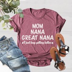 Mom Nana Great Nana Shirt, Mom Shirt, Gift For Grandma, Nana Shirt, Pregnancy Reveal Shirt, Great Nana Gift, Mother's Day Gift, Nana Shirt Welcome to LunaTeeApparel ☺️ Our shirts are clean, high quality and soft. It is prepared quickly by our boutique Ironing and shipped. Enjoy your shopping It is a pleasure for us to help you with your questions and you can reach us at any time. Please, don't forget to check our size cards. HOW TO ORDER SHIRT 👕 Please, choose your favorite t-shirt color and si Lavender Shirt, Nana T Shirts, Pregnancy Reveal Shirt, Nana Shirts, Text Shirt, Applique Shirts, Nana Gifts, Pregnancy Reveal, Gift For Grandma