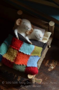 two stuffed animals sitting on top of a wooden chair next to each other in an instagram