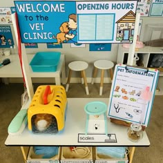 a display in a children's playroom with toys and signs