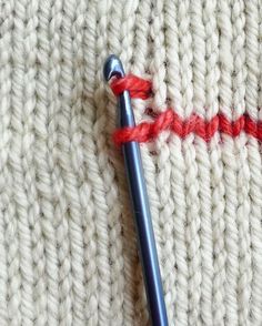 the knitting stitch is being worked on