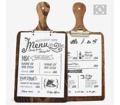 two wooden cutting boards with menus attached to each one, on top of white background