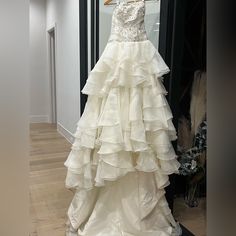 a wedding dress on display in a store