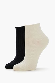 Set of knit quarter - length socks featuring partial ribbed construction. | Two pairs, four pieces total | 79% viscose, 20% polyester, 1% spandex | Hand wash cold | Ribbed Quarter Socks - 2 pack Fitted Black Ribbed Socks, Black Stretch Ribbed Socks, Black Warm Socks, Stretch Ribbed Mid-calf Socks, Cheap Black Non-slip Socks, Ankle Socks, Women's Accessories, Socks, Knitting