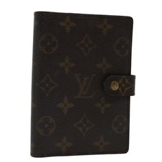 a brown louis vuitton passport case