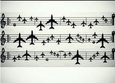 many airplanes are flying over musical notes