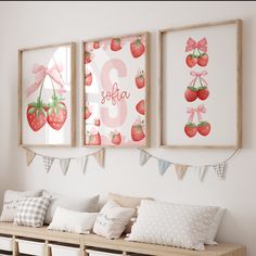 three framed pictures hang on the wall above a wooden bench with pillows and pillow cases