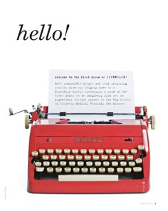 an old fashioned red typewriter with the words hello written on it's screen