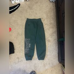 Size - Small / Never Worn Adidas Green Bottoms For Spring, Green Bottoms With Letter Print For Streetwear, Casual Green Adidas Bottoms, Adidas Green Casual Bottoms, Green Sporty Bottoms With Letter Print, Sporty Green Bottoms With Letter Print, Adidas Green Bottoms For Streetwear, Adidas Joggers With Pockets For Streetwear, Adidas Streetwear Bottoms With Elastic Waistband