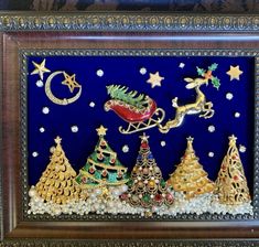 a christmas scene with santa's sleigh, trees and stars in the sky