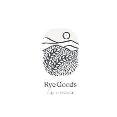 the logo for rye goods in california, with an image of a wheat field and mountains