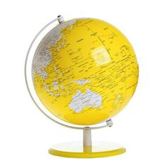 a yellow and white globe on a stand