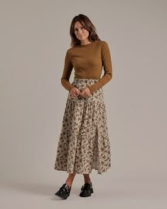 Midi length tiered skirt with elastic waistband.Featuring 'gardenia' all-over print on ivory.Care: Machine wash cold. Tumble dry low.Made of 100% cotton Maxi Skirt Fall, Sunday Clothes, Skirts Ideas, Skirt With Elastic Waistband, Midi Skirt Outfit, Tiered Midi Skirt, How To Wear A Scarf, Tiered Ruffle Skirt, Tiered Maxi Skirt