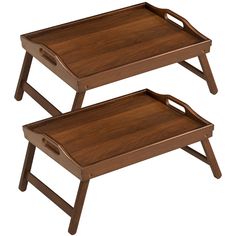 two wooden trays sitting on top of each other