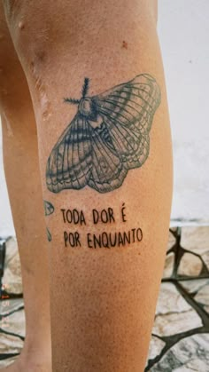 a close up of a person's leg with a tattoo on it that reads, today do de por enquantoto