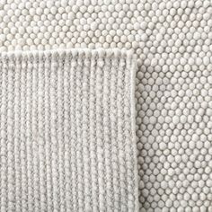 closeup of the texture of a white rug