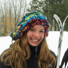 woman wearing a colorful beanie and smiling Knit Hat Pattern, Club Skirts, Sari Silk Ribbon, Purse Pattern, Ribbon Yarn, Learn How To Knit, Yarn Bowl, Easy Knitting Patterns, Sari Silk